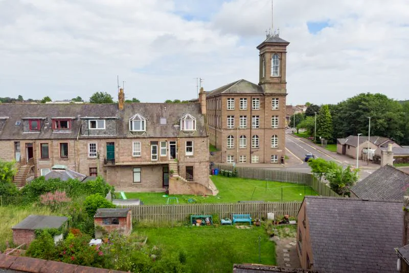 Wider rear view of the Southesk Street property beside the former school building